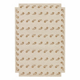 A rectangular area rug in a light beige or cream tone with a repeating pattern of small brown leaf or vine motifs, shown flat against a plain white background.