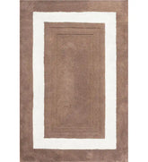 White and brown rug