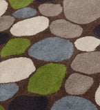 Luxury wool rug featuring rounded stone-like shapes in earthy tones