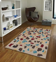 Modern living room with a multicolor abstract pattern rug on wood floor and brown lounge chair