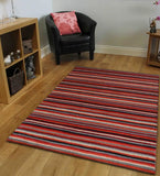 Modern multicolor striped rug in red, orange, grey, and black