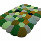 Multicolored patchwork rug on a white background