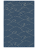 Navy blue and ivory hand-tufted nautical rug with ocean wave pattern.