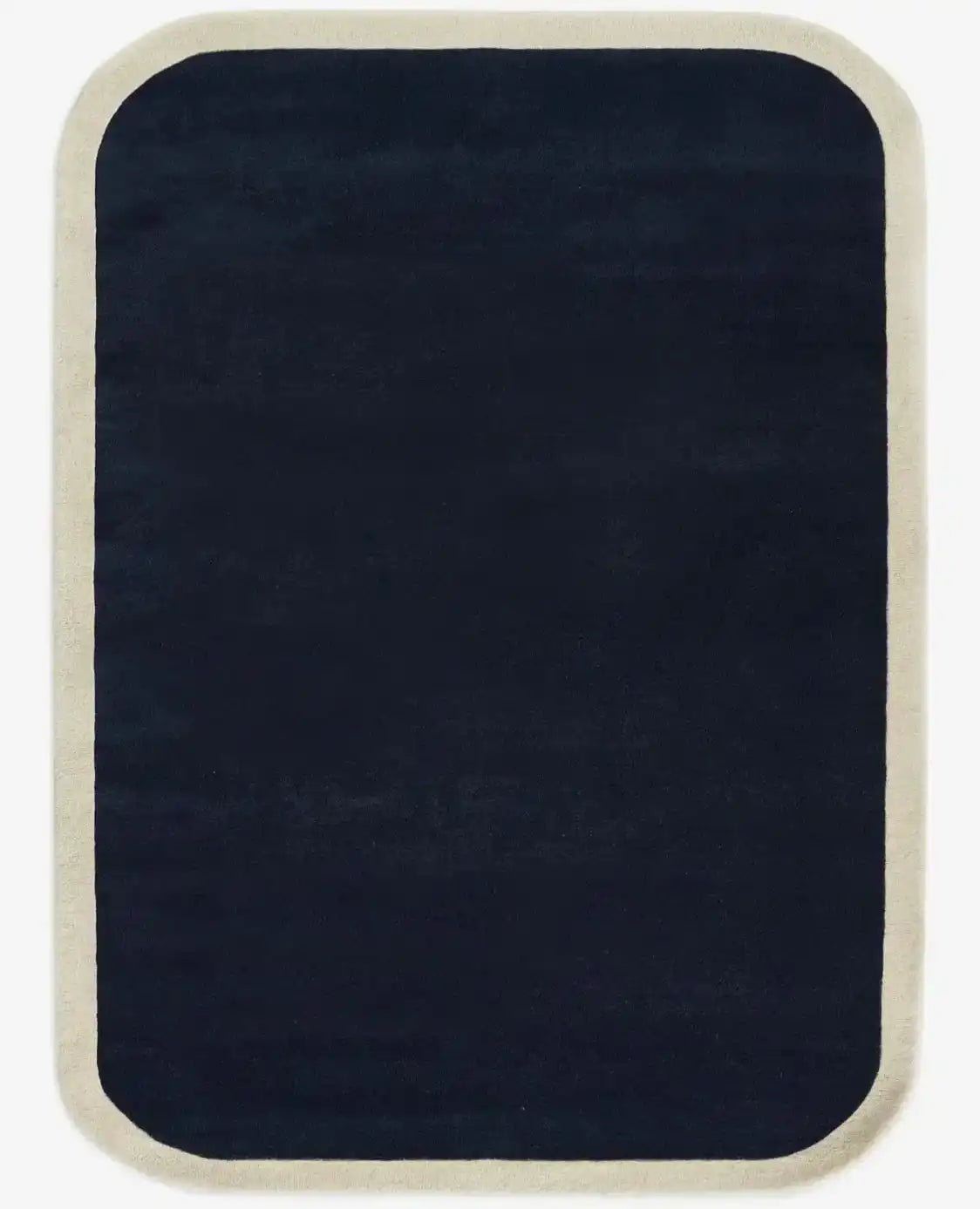 Rectangular navy blue rug with rounded corners and cream border