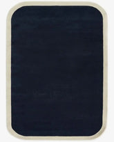 Hand-tufted navy blue wool area rug with cream border modern rectangular carpet for living room or bedroom