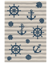 Beige and navy hand-tufted wool nautical rug with anchors and ship wheels.