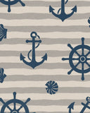 Luxury beige wool rug featuring navy maritime motifs.
