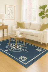 Hand-tufted wool nautical rug featuring compass and rope border.