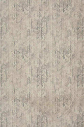 Neutral chevron rug in machine washable fabric.