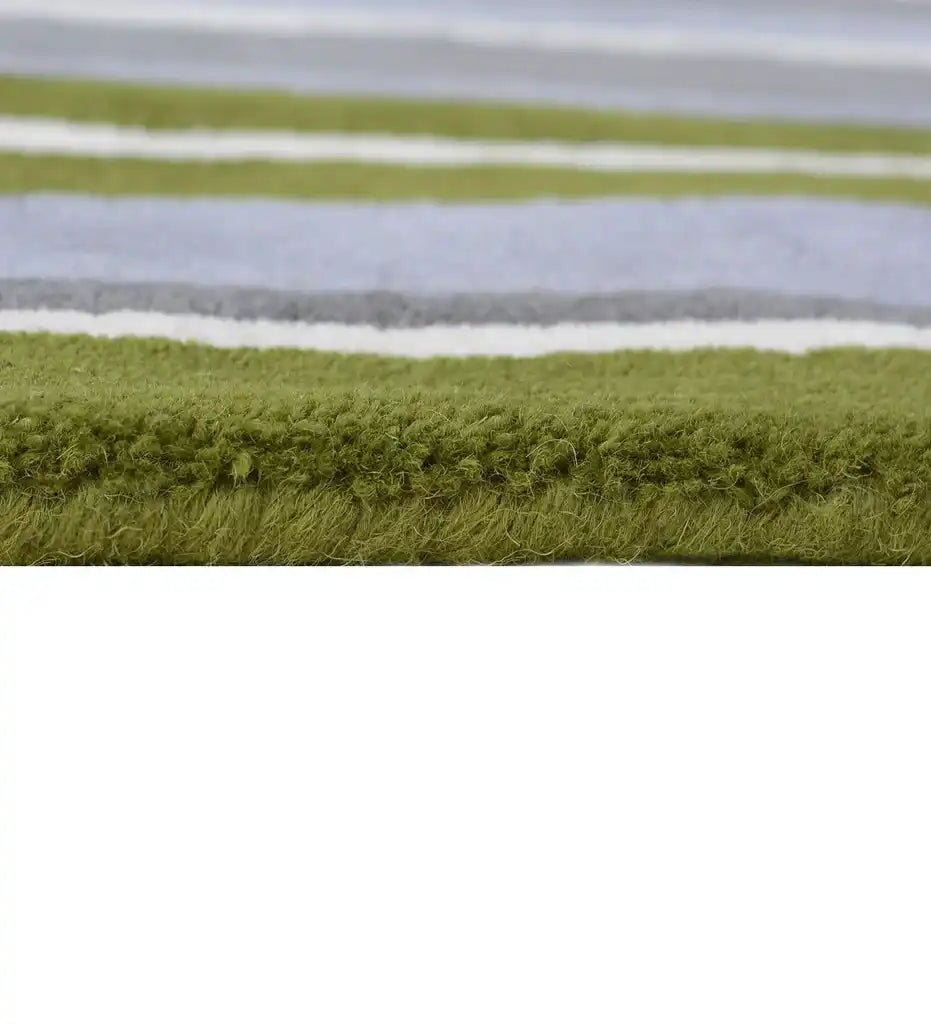 Modern striped wool rug for living room décor in olive green and gray.