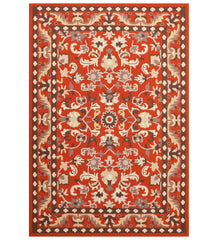 Traditional orange floral hand-tufted wool rug with Oriental design