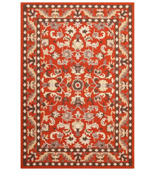 Traditional orange floral hand-tufted wool rug with Oriental design