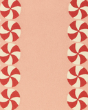 Pink wool Christmas rug with scalloped peppermint edges.