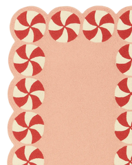 Festive peppermint-border rug in pink for holiday décor.