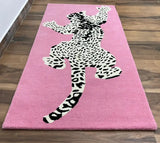 Playful leopard print rug for modern eclectic interiors.