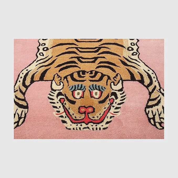 Rug with a tiger design on a pink background