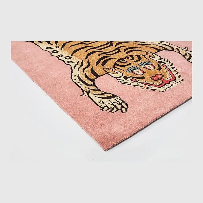 Pink rug with a tiger design on a light gray background
