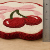 Pink red cherry bow wool rug