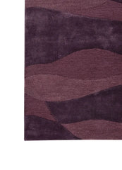 All the shades or hues of purple abstract hand tufted wave patterned rug