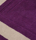 Luxury purple wool rug with minimalist bordered design