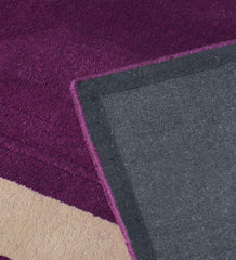 Handcrafted purple and beige rug with embossed rectangle detail