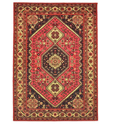 Red antique rug with ornate vintage patterns.