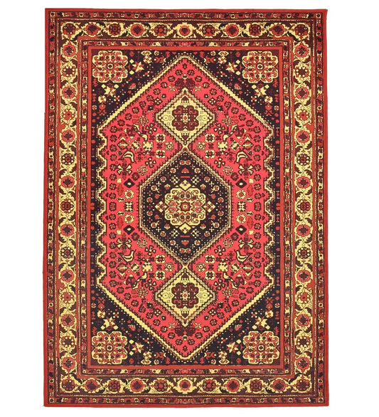 Red antique rug with ornate vintage patterns.