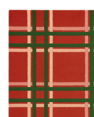 Plaid Christmas area rug with classic holiday colors.