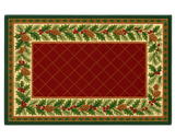 Red holiday rug featuring holly, berries, and pinecone trim.