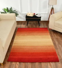 Modern ombre rug transitioning from deep red to golden beige
