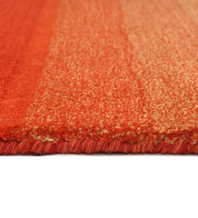 Contemporary wool rug with vibrant red-to-orange gradient