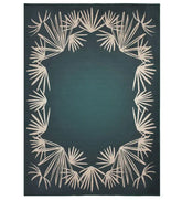 Rich teal area rug with deep jewel tones.