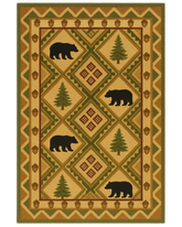 Rustic beige and green hand-tufted wool cabin rug with bear and pine design.