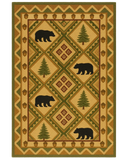 Rustic beige and green hand-tufted wool cabin rug with bear and pine design.