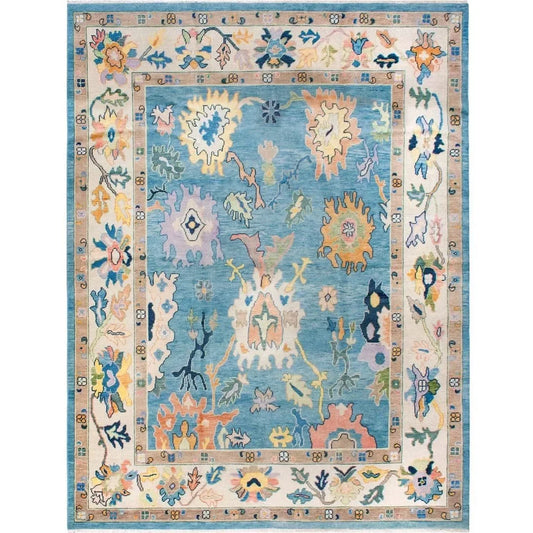 Hand-knotted sky blue Oushak wool rug with traditional floral patterns
