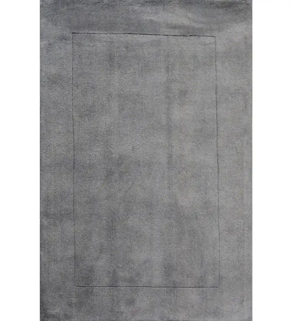 Soft grey solid hand-tufted wool rug with embossed border