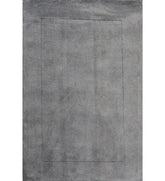 Soft grey solid hand-tufted wool rug with embossed border