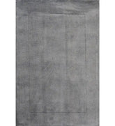 Soft grey solid hand-tufted wool rug with embossed border