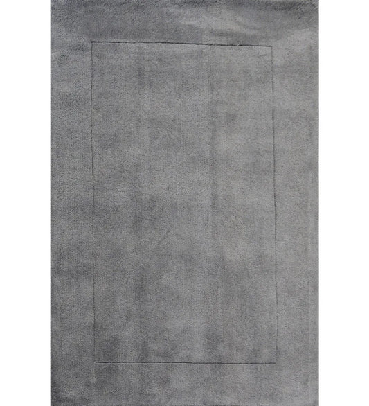 Soft grey solid hand-tufted wool rug with embossed border