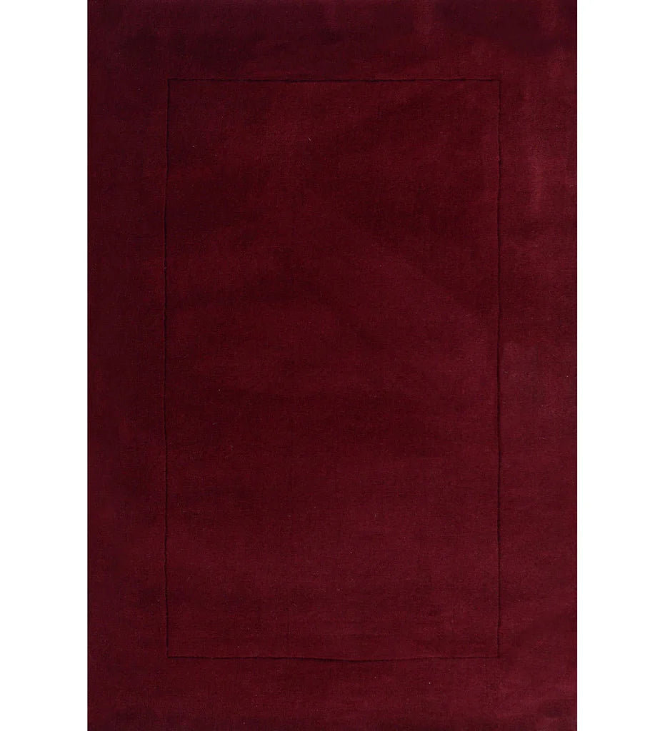Solid maroon hand-tufted wool rug with minimalist rectangle design