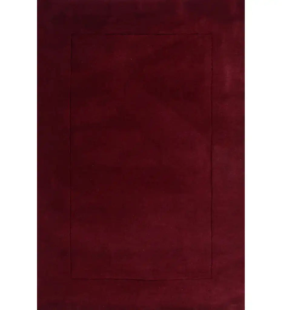 Solid maroon hand-tufted wool rug with minimalist rectangle design