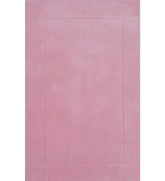 Solid pink hand-tufted wool rug with embossed rectangle design