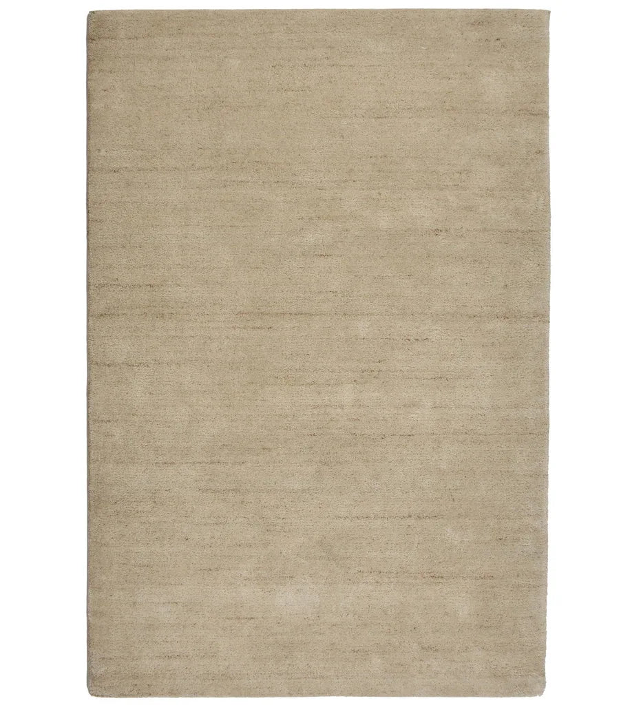 Solid taupe hand-tufted wool rug with neutral minimalist design