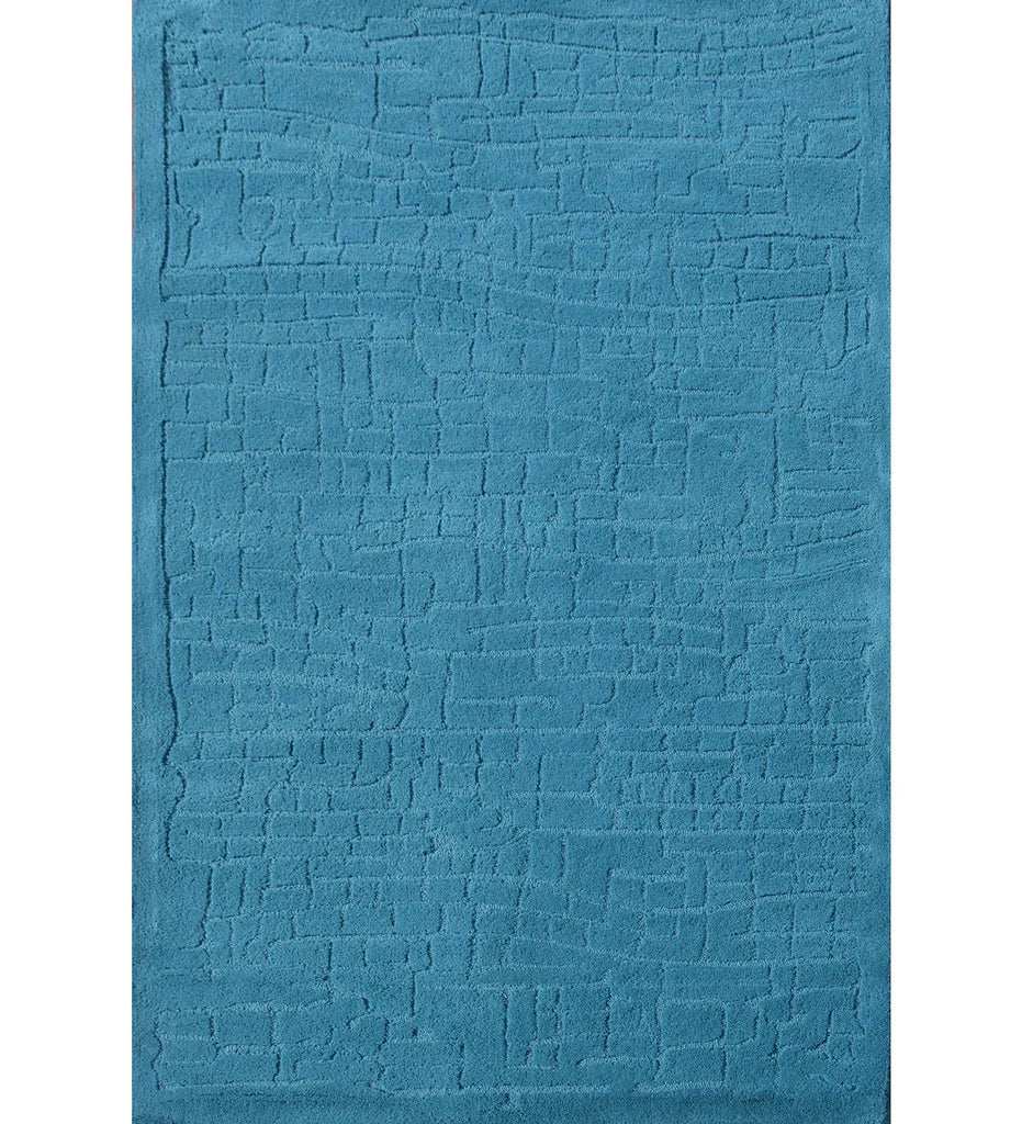 Teal textured hand-tufted wool rug with subtle geometric design