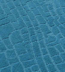 Luxury minimalist teal hand-tufted rug with texture