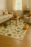 Cozy living room with beige sofa and armchair, wooden coffee table, Halloween rug, and decorative pumpkins
