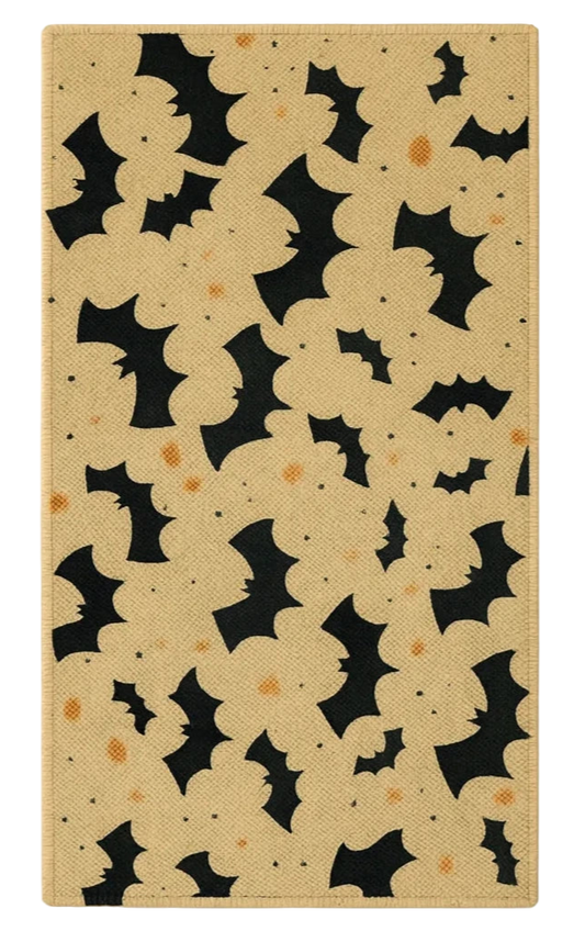 Halloween rug with black bats flying across beige background.