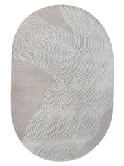 Taupe and white hand-tufted oval wool rug with modern wavy line design.