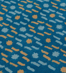 Luxury teal rug with white and yellow geometric dot pattern