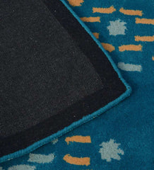 Hand-tufted contemporary rug with dotted abstract cascade design